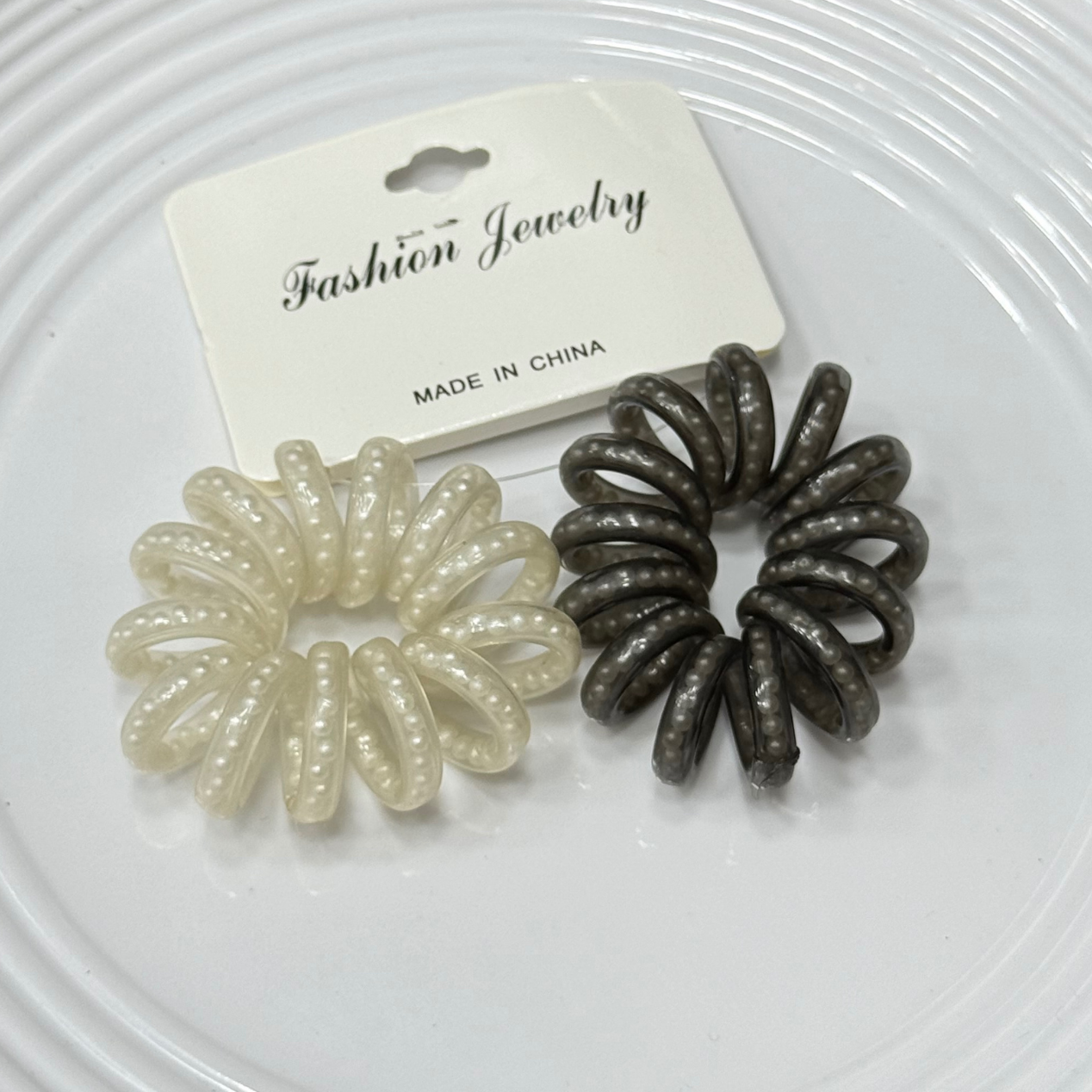 DOCENA MOÑA RESORTE